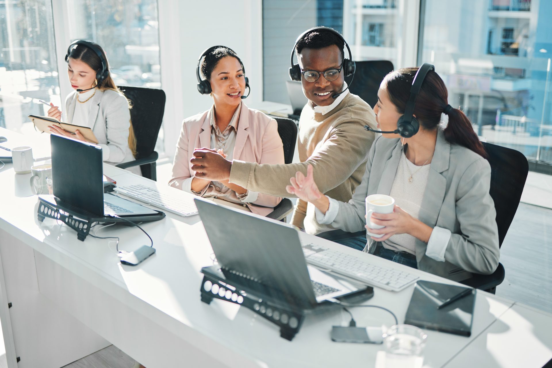 call-center-staff-group-and-talk-at-help-desk-wit-2026-03-25-01-40-48-utc