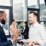 smiling-multicultural-businessmen-having-conversat-2024-11-17-20-45-52-utc